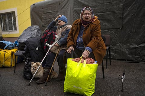 Evacuated neighbours from Irpin gather in an assistant center on the outskirts of Kyiv, Ukraine, Wednesday, March 30, 2022. (Photo | AP)