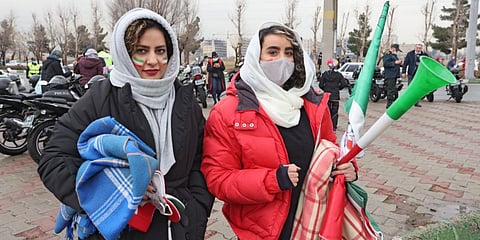 Women supporters gather ahead of the 2022 Qatar World Cup Asian Qualifiers match between Iran and Iraq, at the Azadi Sports Complex in Tehran. (File photo| AFP)
