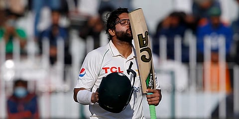 Pakistan's Imam-ul-Haq celebrates his century during Day 1 of the 1st Test match against Australia at the Pindi Stadium in Rawalpindi. (Photo| AP)