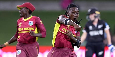 West Indies Deandra Dottin celebrates the dismissal of New Zealand's Fran Jonas during a 2022 Women's World Cup match at Bay Oval in Mount Maunganu. (Photo| AFP)