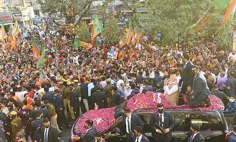 PM Narendra Modi during a roadshow in Varanasi on Friday. (Photo | EPS)