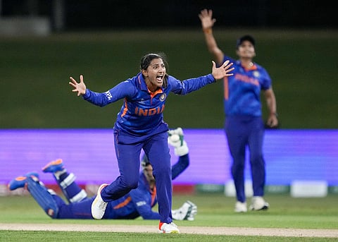 Sneh Rana celebrates after Richa Ghosh takes catch to dismiss Nashra Sandhu of Pakistan during the women's world cup cricket match between India and Pakistan at Bay Oval in New Zealand. (Photo| AP)