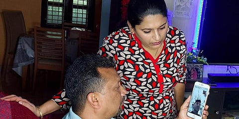 Glenwill Fernandes' parents on a video call with him.