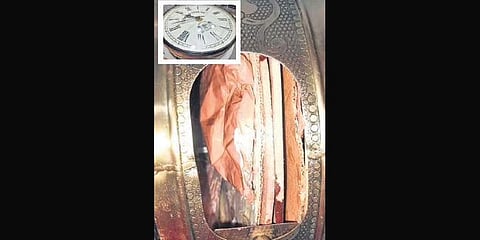 The half-a-kg amphetamine worth  Rs 40 lakh concealed in an antique wall clock (inset) 