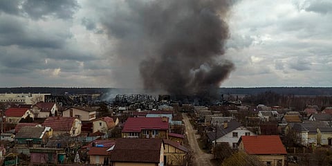 A factory and a store burn after being bombarded in Irpin, on the outskirts of Kyiv, Ukraine. (File Photo | AP)
