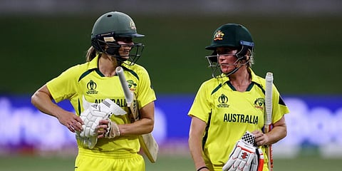 Australia's Ellyse Perry (L) and Beth Mooney walk from the field after their win at a Women's World Cup match against Pakistan at Bay Oval in Tauranga. (Photo| AFP)