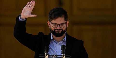 FILE - Chilean President-elect Gabriel Boric waves as he announces his cabinet appointments in Santiago, Chile, Friday, Jan. 21, 2022. Boric will be sworn-in as president on March 11. (Photo | AP)
