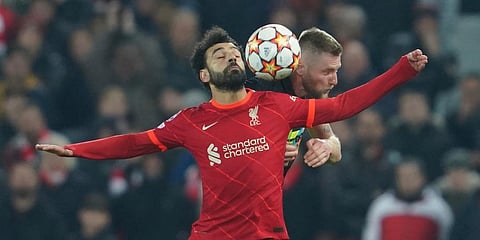 Liverpool's Mohamed Salah, left, fights for the ball with Inter Milan's Milan Skriniar during their Champions League, round of 16, second leg match at Anfield Stadium, March 8, 2022. (Photo | AP)
