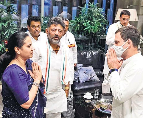 Senior Congress leader Rahul Gandhi greets Ashwini, wife of actor Puneeth Rajkumar, at the latter’s residence in Bengaluru on Thursday | EXPRESS