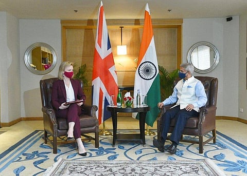 In this photo provided by Indian Foreign Minister S. Jaishankar's Twitter handle, Jaishankar, right and Britain's Foreign Secretary Liz Truss meet before their discussions in New Delhi. (Photo | AP)