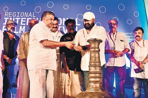 Cultural Minister Saji Cherian and actor Mohanlal at the inaugural function of the Regional International Film Festival of Kerala at Sarita Theatre in Kochi on Friday | Albin Mathew