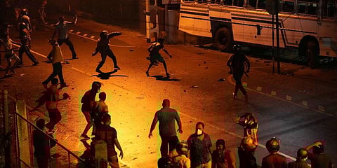 Sri Lankans riot during a protest outside Sri Lanka President Gotabaya Rajapaksa's private residence on the outskirts of Colombo, Sri Lanka. (Photo | AP)