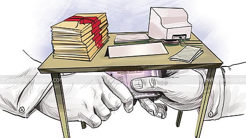 The accused, identified as Chithra, employed as a surveyor at the Walajah taluk office, was nabbed following a complaint lodged by Karthikeyan