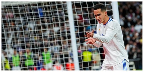 Real Madrid's Lucas Vazquez celebrates after scoring his side's second goal during the Spanish La Liga soccer match between Real Madrid and Getafe at the Santiago Bernabeu stadium in Madrid.