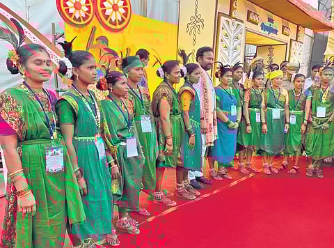 Koya performers pose with Union Culture Minister G Kishan Reddy at an event in Hyderabad