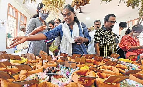 Visitors inspect exhibits during the Chennai Roots and Tubers Festival (Photo | R Satish Babu)