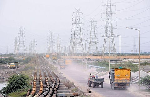 Dry fly ash from the North Chennai Thermal Power Station forms a thick layer of dust in North Chennai. (Photo | EPS)