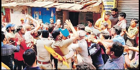 Police personnel trying to stop warring groups at Joda town on Monday | Express