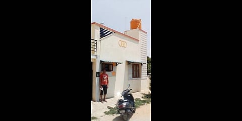 Property owners captured  outside their homes at Ramagondanahalli of the upcoming Dr Shivaram Karanth Layout when officials visited the area to ready Correct Dimension reports in the area | Express