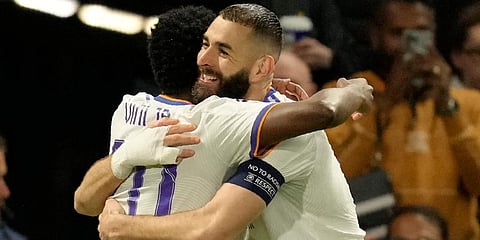Real Madrid's Karim Benzema celebrates after scoring his side's third goal during a Champions League first-leg quarterfinal match against Chelsea at Stamford Bridge Stadium in London. (Photo | AP)