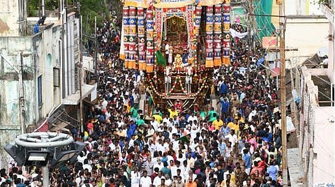 Devotees drawing the car of Thanjavur Big temple on Wednesday | Express