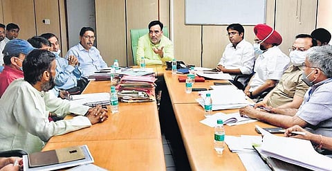 Development Minister Gopal Rai along with other senior officials in a meeting at Delhi Secretariat on Thursday | express