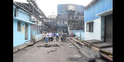 Officials inspecting the chemical factory after the blast at Musunuru mandal in Eluru district on Thursday. | Express'