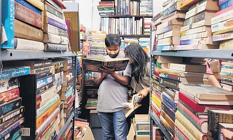 A number of books across various genres stacked on bookshelves at the Sisters of People’s bookstore, Lajpat Bhawan | ANJANI CHADHA