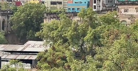 A screencap of the video showing demolition work in King Kothi Palace.