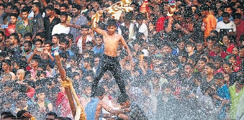 Youth in a jubilant mood during the Chithirai Festival on Saturday | k k sundar