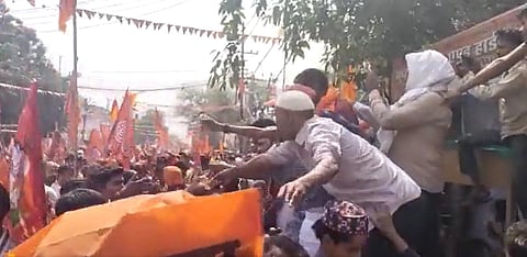 Muslims offer juice to Hindu devotees during a Shobha Yatra procession in Noida. (Photo| Twitter screengrab)