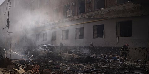 Firefighters work to extinguish multiple fires after a Russian attack in Kharkiv, Ukraine. (Photo| AP)