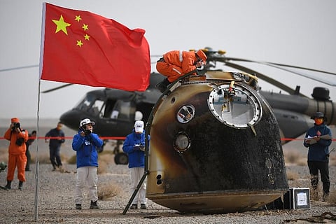 The return capsule of the Shenzhou-13 manned space mission is seen after landing at the Dongfeng landing site in northern China's Inner Mongolia Autonomous Region. (Photo | AP)