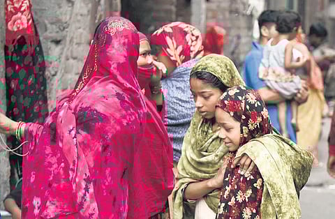 residents outside their houses after the clash | SHEKHAR YADAV