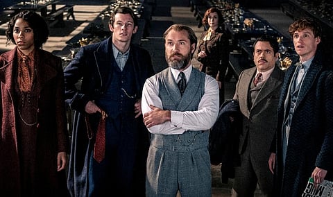 This image released by Warner Bros. Pictures shows, from left, Jessica Williams, Callum Turner, Jude Law, Fionna Glascott, Dan Fogler and Eddie Redmayne in a scene from Fantastic Beasts. ( Photo | AP)