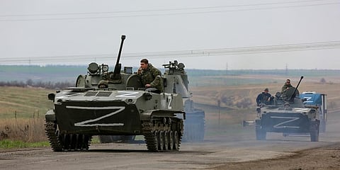 Russian military vehicles move on a highway in an area controlled by Russian-backed separatist forces near Mariupol, Ukraine. (File Photo | AP)