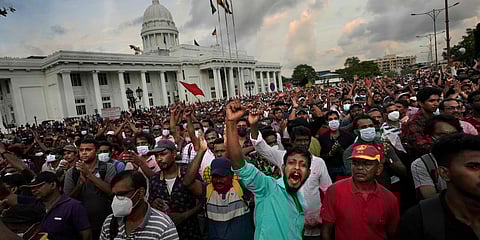 Members of Sri Lanka's opposition political party National People's Power shout anti-government slogans during a protest rally in Colombo. (Photo| AP)
