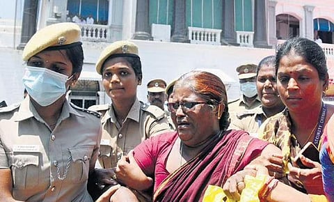 A woman from Salem district being taken away by police personnel after staging a protest at the Secretariat | R Satish Babu