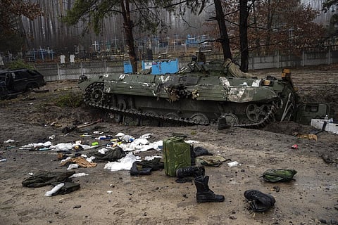 Military gear left by Russian soldiers are seen during a military sweep to search for possible remnants of Russian troops. (Photo | AP)