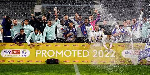 Fulham celebrates promotion to the Premier League after the League Championship soccer match against Preston at Craven Cottage, in London. (Photo | AP)