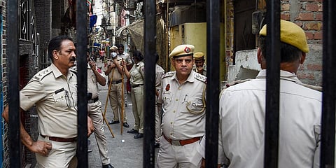 Tight security after clashes broke out between two communities during a Hanuman Jayanti procession on Saturday, at Jahangirpuri in New Delhi. (Photo | PTI)