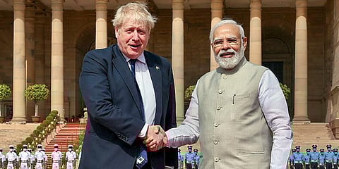 PM Narendra Modi (R) and British counterpart Boris Johnson at a meeting at Hyderabad House, in New Delhi. (Photo | PTI)