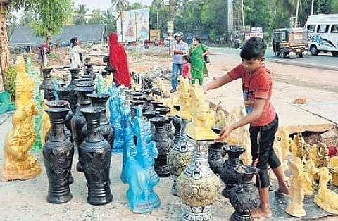 Marwari idol makers from Rajasthan at their ‘sales spot’ by the NH-66 in Pookad near Koyilandy | T P Sooraj