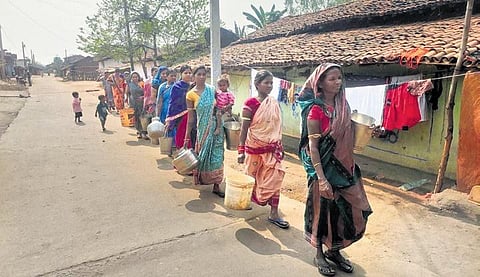 Women walk with their pitchers to collect water in Balangir’s Turekela  | Express