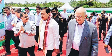 Union Minister Sonowal (centre) on way to attend the riverine jetty | Express