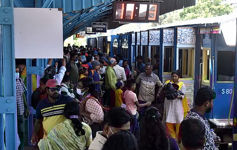 Tourists wait for summer special train to Ooty