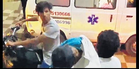 A man was forced to carry the body of his son on a motorcycle when ambulance operators at Ruia Hospital in Tirupati demanded an abnormal fare | Express