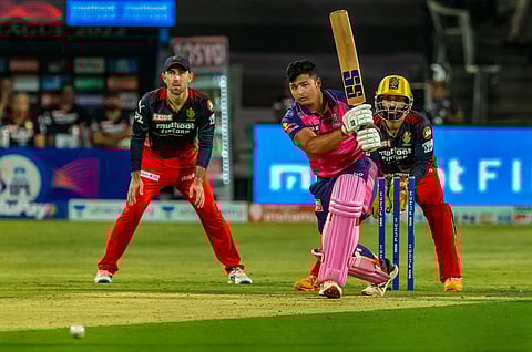 Riyan Parag of Rajasthan Royals plays a shot during the Indian Premier League 2022 cricket match between Royal Challengers Bangalore and the Rajasthan Royals. (Photo | PTI)