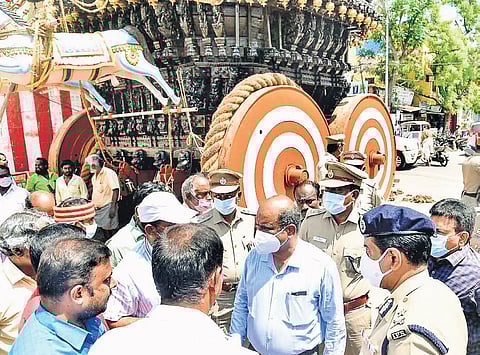 Officials inspecting the temple car and the route on Thursday ahead of the Srirangam Sri Ranganathaswamy Temple car festival | Express