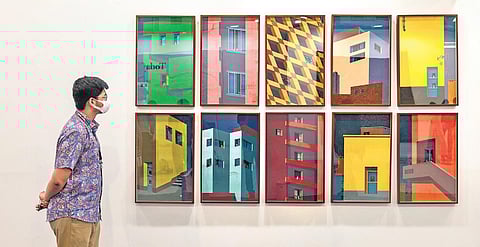 A visitor exploring  artworks at IAF 2022